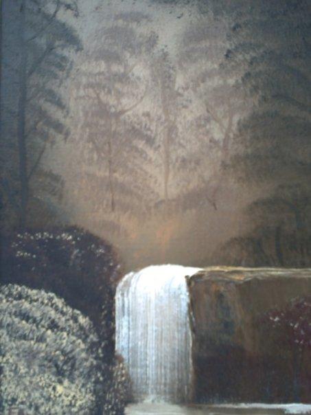 Waterfall in a misty forest